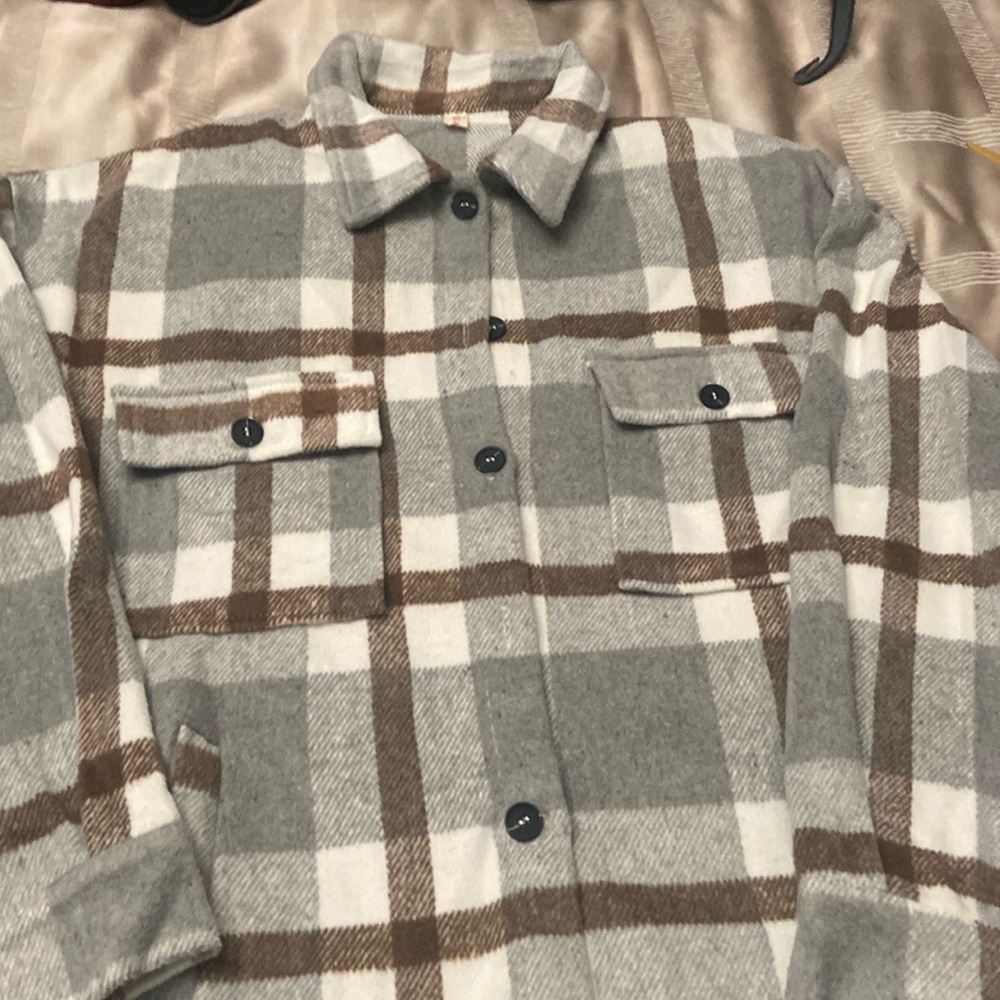 Casual very comfortable shirt jacket. 100% polyester.
